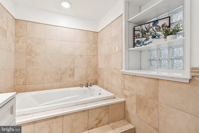 1013 S Decker Ave, Baltimore, MD 21224 - bathroom featuring a garden tub, tile walls, and vanity