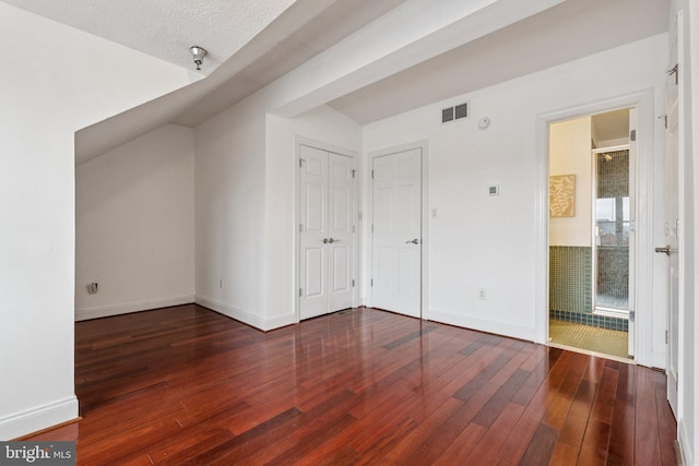 1013 S Decker Ave, Baltimore, MD 21224 - additional living space with wood-type flooring, lofted ceiling, and a textured ceiling