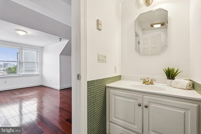 1013 S Decker Ave, Baltimore, MD 21224 - bathroom featuring vanity and wood finished floors