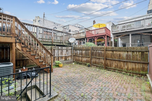 1013 S Decker Ave, Baltimore, MD 21224 - fenced backyard with a patio and stairs