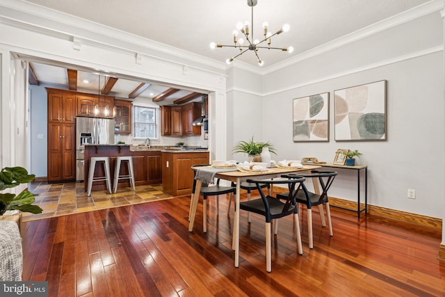 1013 S Decker Ave, Baltimore, MD 21224 - dining area with a chandelier, dark wood-type flooring, and ornamental molding