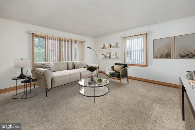 207 E Main St, Penns Grove, NJ 08069 - living area featuring plenty of natural light and carpet