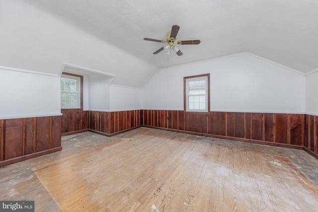 207 E Main St, Penns Grove, NJ 08069 - additional living space featuring hardwood / wood-style floors, wainscoting, lofted ceiling, a ceiling fan, and wooden walls