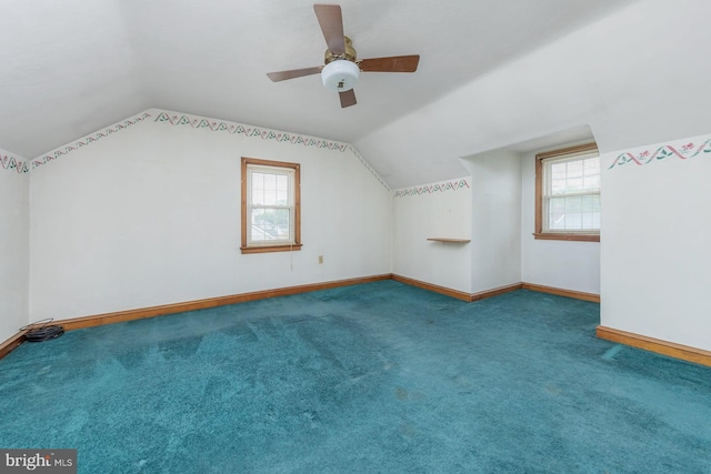 207 E Main St, Penns Grove, NJ 08069 - additional living space featuring vaulted ceiling, healthy amount of natural light, carpet, and a ceiling fan