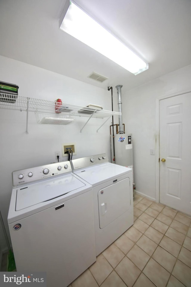 43 Glenview Way E, Gibbsboro, NJ 08026 - laundry room with washer and clothes dryer, light tile patterned flooring, and electric water heater