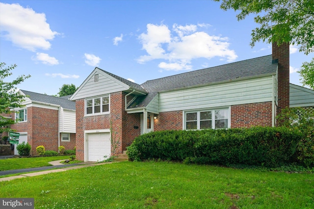 204 Opal Ave, Reading, PA 19606 - view of front of house featuring a garage, a front yard, brick siding, and a chimney