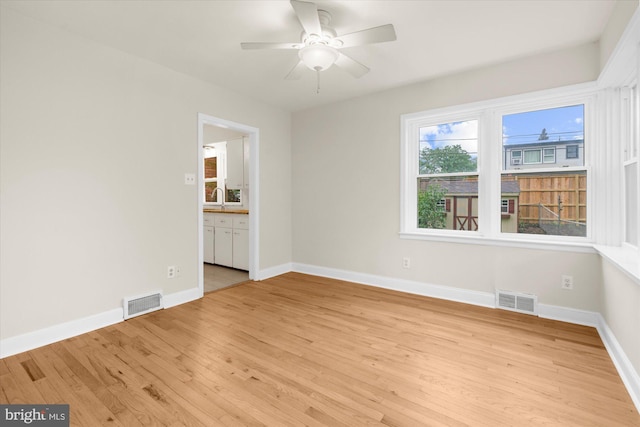 204 Opal Ave, Reading, PA 19606 - empty room with light wood-type flooring and ceiling fan