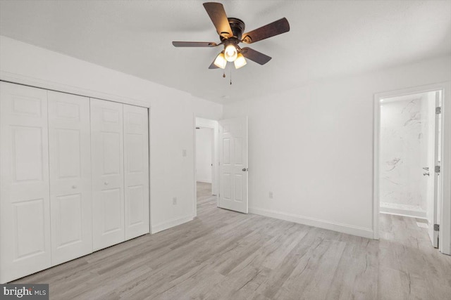 95 Arthur Burke Ln, Front Royal, VA 22630 - unfurnished bedroom featuring light wood-type flooring, a closet, connected bathroom, and ceiling fan