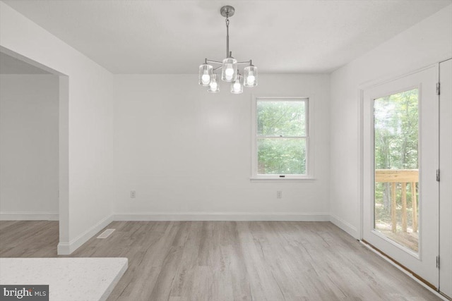 95 Arthur Burke Ln, Front Royal, VA 22630 - empty room with light wood-style flooring and a chandelier