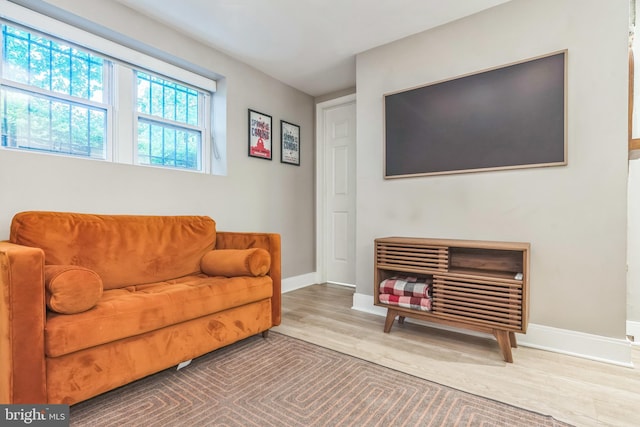 459 Massachusetts Ave NW Unit B1, Washington, DC 20001 - sitting room featuring baseboards and wood finished floors