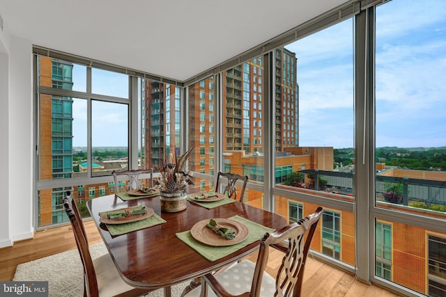 11990 Market St Unit 907, Reston, VA 20190 - dining room with expansive windows and wood finished floors