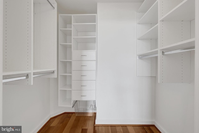 11990 Market St Unit 907, Reston, VA 20190 - walk in closet with wood finished floors