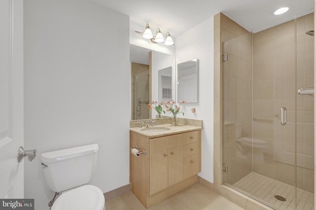 11990 Market St Unit 907, Reston, VA 20190 - bathroom featuring a shower stall, vanity, and tile patterned flooring