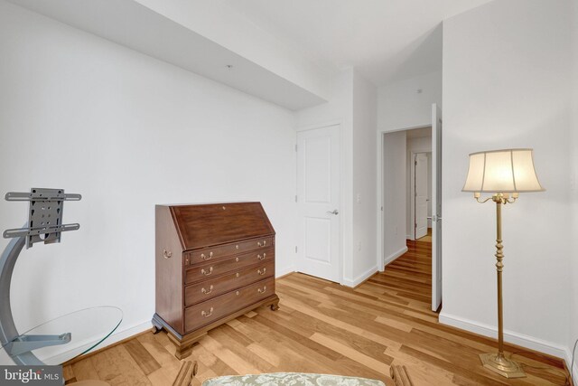 11990 Market St Unit 907, Reston, VA 20190 - bedroom with light wood finished floors and baseboards