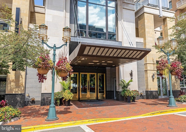 11990 Market St Unit 907, Reston, VA 20190 - property entrance featuring french doors and stone siding