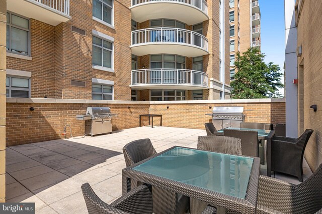 11990 Market St Unit 907, Reston, VA 20190 - view of patio / terrace with outdoor dining area and area for grilling