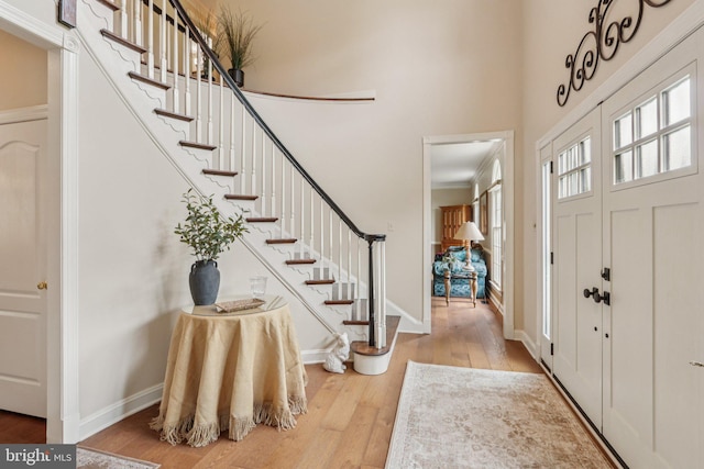 660 Casey Ln, West Chester, PA 19382 - entryway with hardwood / wood-style floors, stairway, and a high ceiling