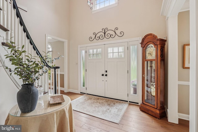 660 Casey Ln, West Chester, PA 19382 - foyer featuring a high ceiling, stairs, and light wood-style flooring