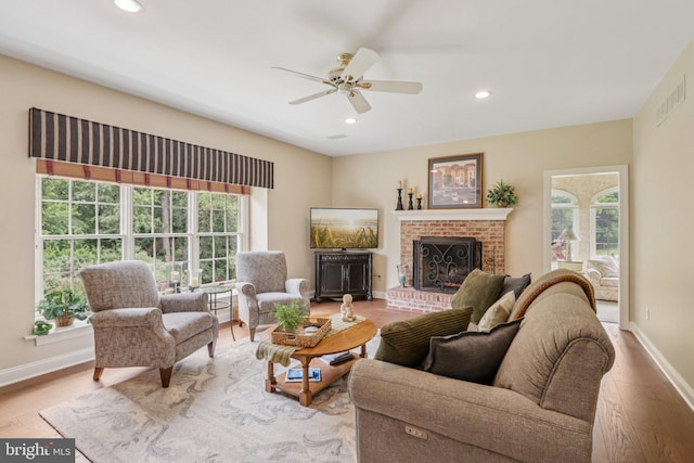 660 Casey Ln, West Chester, PA 19382 - living room with a fireplace, wood finished floors, recessed lighting, and a ceiling fan