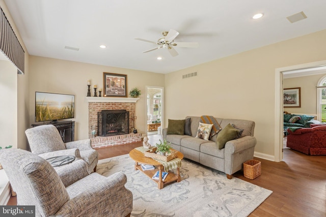 660 Casey Ln, West Chester, PA 19382 - living room with ceiling fan, wood finished floors, recessed lighting, and a brick fireplace