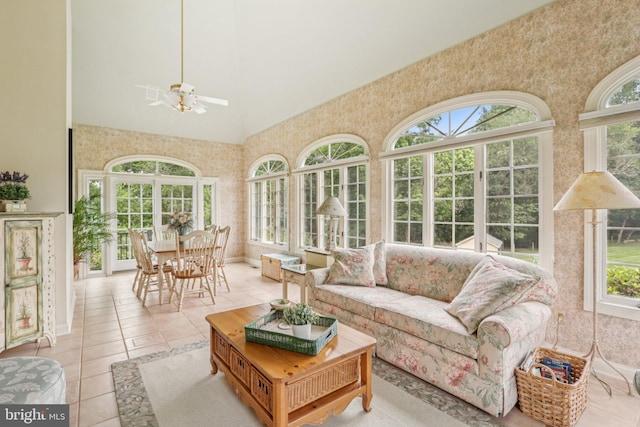 660 Casey Ln, West Chester, PA 19382 - sunroom with high vaulted ceiling, plenty of natural light, tile patterned flooring, and wallpapered walls