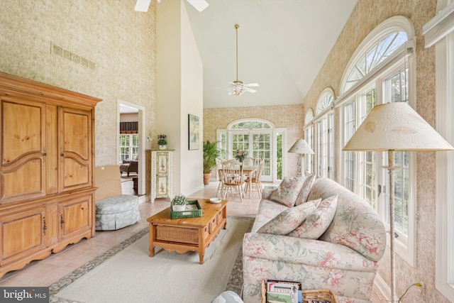660 Casey Ln, West Chester, PA 19382 - living area featuring a ceiling fan, high vaulted ceiling, inlaid floor details, and light tile patterned floors