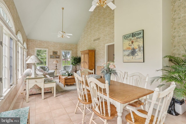 660 Casey Ln, West Chester, PA 19382 - dining space with ceiling fan, high vaulted ceiling, wallpapered walls, and light tile patterned flooring