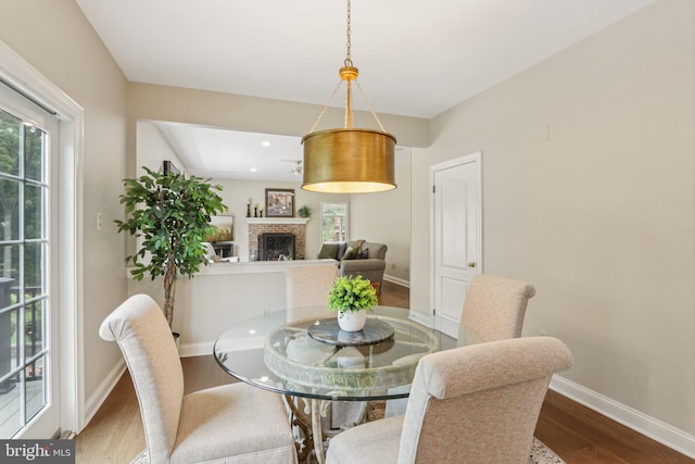 660 Casey Ln, West Chester, PA 19382 - dining room with wood finished floors, a fireplace, and recessed lighting