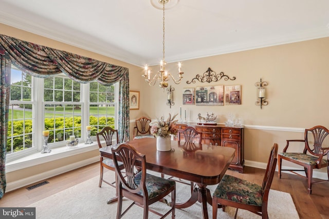660 Casey Ln, West Chester, PA 19382 - dining room with a chandelier, crown molding, and wood finished floors