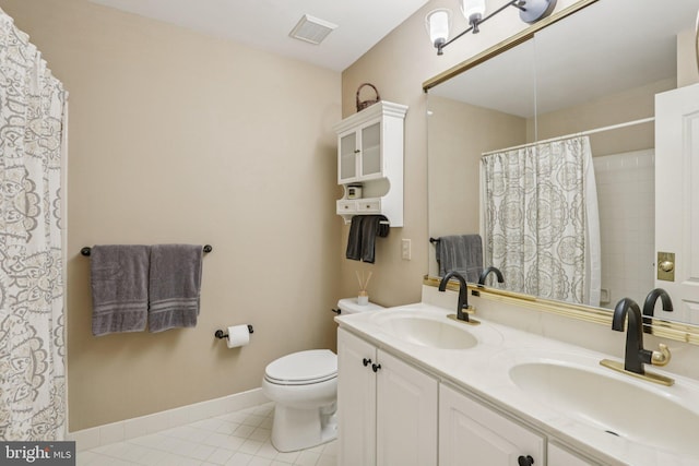 660 Casey Ln, West Chester, PA 19382 - full bathroom with double vanity, tile patterned flooring, and a shower with shower curtain