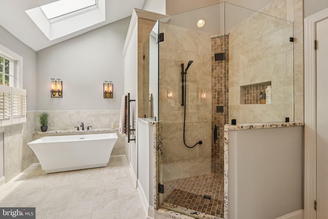 660 Casey Ln, West Chester, PA 19382 - full bath with a skylight, a freestanding tub, a shower stall, lofted ceiling, and wainscoting