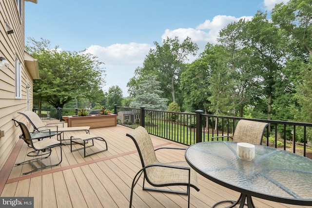660 Casey Ln, West Chester, PA 19382 - wooden terrace featuring outdoor dining space and view of scattered trees
