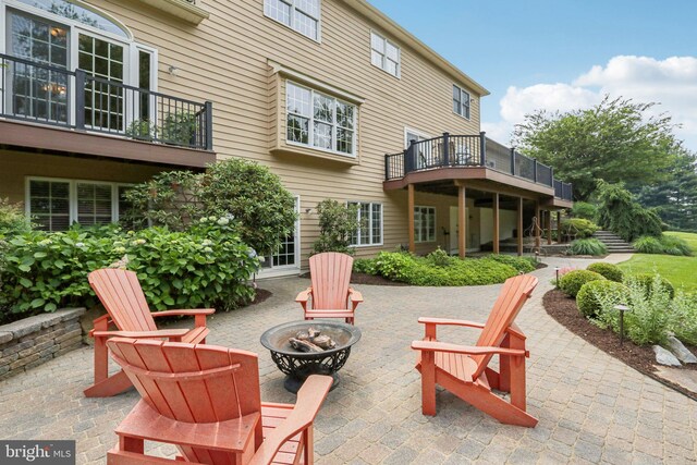 660 Casey Ln, West Chester, PA 19382 - view of patio / terrace featuring a fire pit