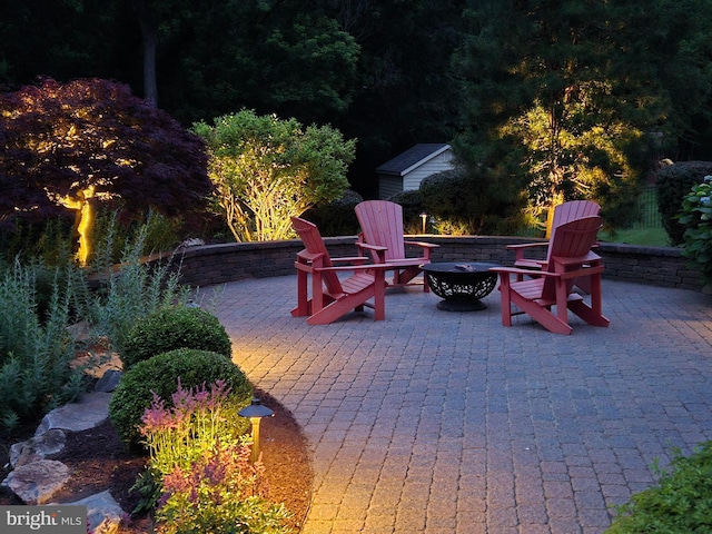 660 Casey Ln, West Chester, PA 19382 - view of patio / terrace featuring an outdoor fire pit and a storage unit