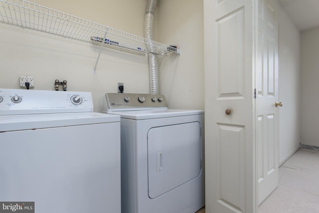 237 Cliff Ln, Elizabethtown, PA 17022 - laundry area featuring washer and clothes dryer and light colored carpet