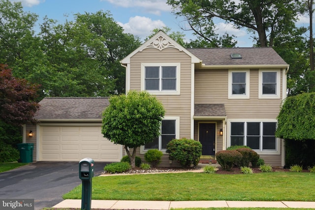 237 Cliff Ln, Elizabethtown, PA 17022 - view of front of property featuring asphalt driveway, a front yard, and roof with shingles