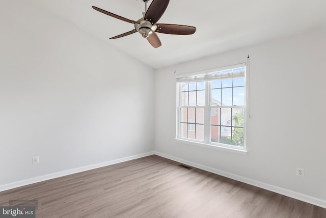 25154 Monteith Ter, Chantilly, VA 20152 - empty room with wood finished floors, a ceiling fan, and vaulted ceiling