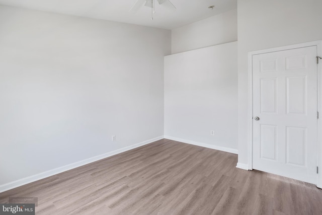 25154 Monteith Ter, Chantilly, VA 20152 - unfurnished bedroom featuring wood finished floors and a ceiling fan