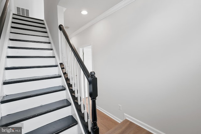 25154 Monteith Ter, Chantilly, VA 20152 - stairway featuring ornamental molding, wood finished floors, and recessed lighting