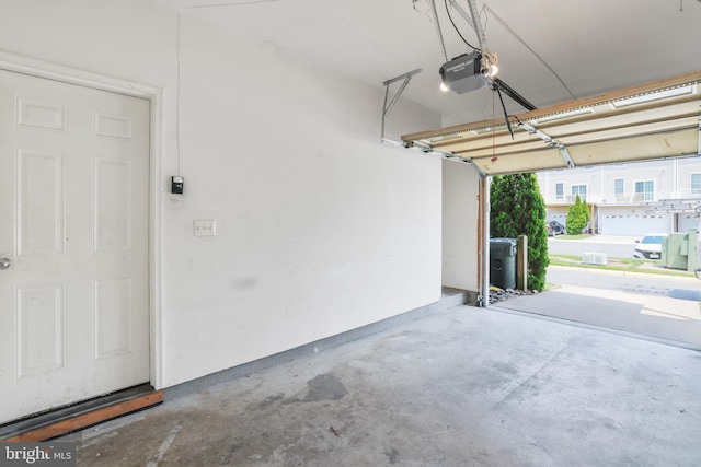 25154 Monteith Ter, Chantilly, VA 20152 - garage featuring a garage door opener