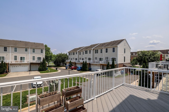 25154 Monteith Ter, Chantilly, VA 20152 - wooden deck featuring a residential view and a garage