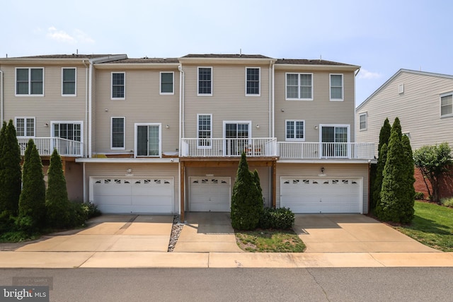 25154 Monteith Ter, Chantilly, VA 20152 - rear view of house with an attached garage and driveway