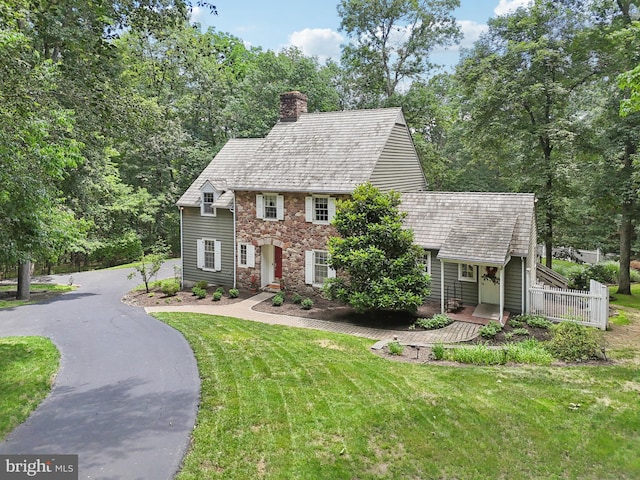 4250 Fretz Mill Rd, New Hope, PA 18938 - view of front of house featuring a chimney and a front yard