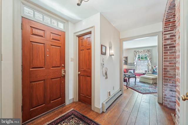 4250 Fretz Mill Rd, New Hope, PA 18938 - foyer entrance with a baseboard heating unit and hardwood / wood-style floors