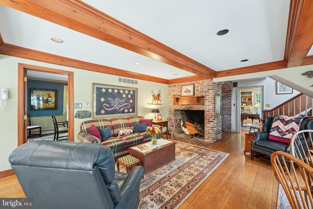 4250 Fretz Mill Rd, New Hope, PA 18938 - living room with hardwood / wood-style floors, beam ceiling, stairway, and a fireplace