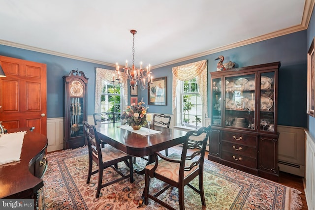 4250 Fretz Mill Rd, New Hope, PA 18938 - dining area featuring a chandelier, ornamental molding, wainscoting, a baseboard heating unit, and wood finished floors
