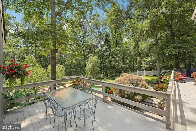 4250 Fretz Mill Rd, New Hope, PA 18938 - wooden terrace featuring outdoor dining space and view of scattered trees