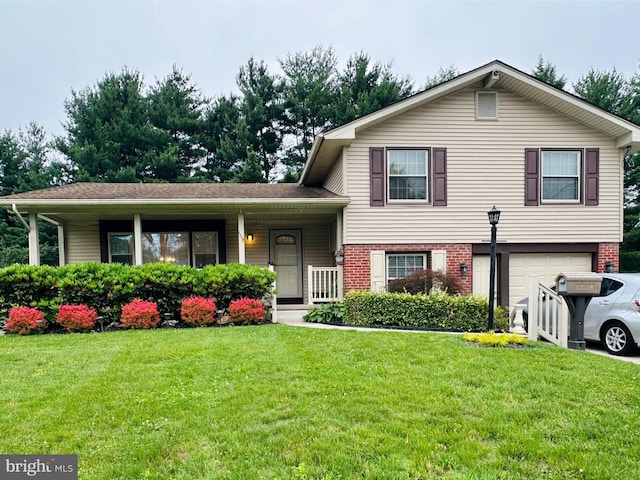 1119 Haral Pl, Cherry Hill, NJ 08034 - tri-level home with a garage, brick siding, a front yard, and a porch