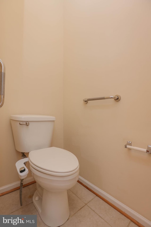 8804 Shining Oceans Way Unit 53, Columbia, MD 21045 - half bath with toilet and tile patterned floors