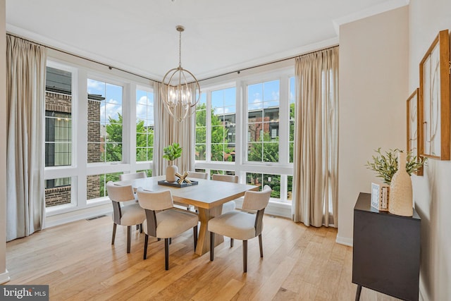 11724 Paysons Way, Reston, VA 20191 - dining area with a chandelier and light wood-type flooring